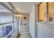 Inviting entryway with a secure front door, sidelight, and views into the home at 3941 Glen Oaks E Dr # 32, Sarasota, FL 34232