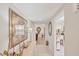 Well-lit hallway with neutral walls leading to various living spaces at 3941 Glen Oaks E Dr # 32, Sarasota, FL 34232