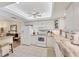 Charming kitchen with white cabinets and stainless steel appliances at 3941 Glen Oaks E Dr # 32, Sarasota, FL 34232