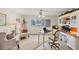Comfortable home office featuring large desk, furnishings, and a relaxing view out of the window at 3941 Glen Oaks E Dr # 32, Sarasota, FL 34232