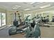 Well-equipped fitness center with various exercise machines and ample space at 4009 Crockers Lake Blvd # 22, Sarasota, FL 34238