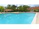 Community pool and deck has ample seating for residents at 4009 Crockers Lake Blvd # 22, Sarasota, FL 34238