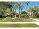 Professionally landscaped Welcome Center with lush greenery and a fountain at 4009 Crockers Lake Blvd # 22, Sarasota, FL 34238