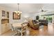 Open concept view of living room and dining area at 4015 Lake Bayshore Dr # 108, Bradenton, FL 34205