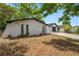 Charming exterior showcasing unique architecture and manicured landscaping at 4233 Abaco Ct, New Port Richey, FL 34653