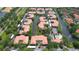 Community aerial view showcasing the meticulously landscaped grounds and pristine waterways at 4264 Central Sarasota Pkwy # 116, Sarasota, FL 34238