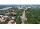 Community aerial view showcasing well-maintained landscaping, waterways, and roadways at 4264 Central Sarasota Pkwy # 116, Sarasota, FL 34238