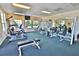 A well-equipped fitness center offering a variety of exercise machines, set in a spacious and well-lit room at 4264 Central Sarasota Pkwy # 116, Sarasota, FL 34238