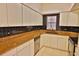 A bright kitchen has granite countertops and stainless steel appliances at 4264 Central Sarasota Pkwy # 116, Sarasota, FL 34238