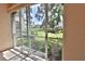 Outdoor view of the lawn from the screened-in patio area at 4264 Central Sarasota Pkwy # 116, Sarasota, FL 34238