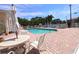 Scenic community pool area featuring ample seating and well-manicured landscaping at 4264 Central Sarasota Pkwy # 116, Sarasota, FL 34238