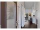 Welcoming foyer with hardwood floors leading to the living area at 4435 Beauchamp Ct, Sarasota, FL 34243