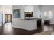 Stylish kitchen with dark wood cabinets, granite countertops, and an open design at 4435 Beauchamp Ct, Sarasota, FL 34243