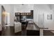 Modern kitchen featuring granite countertops, stainless steel appliances, and sleek cabinetry at 4435 Beauchamp Ct, Sarasota, FL 34243