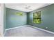 Spacious, airy bedroom featuring ample windows, neutral walls, and soft carpeting, creating a comfortable retreat at 4579 Tuscana Dr, Sarasota, FL 34241