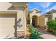 Charming home exterior showcasing stone accents, well-manicured landscaping, and a neatly paved walkway at 4579 Tuscana Dr, Sarasota, FL 34241