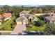 Beautifully landscaped home with a paver driveway, and a three-car garage at 4579 Tuscana Dr, Sarasota, FL 34241