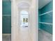 Hallway view leading to the bedroom and walk-in closet at 4579 Tuscana Dr, Sarasota, FL 34241
