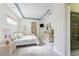 Bright main bedroom showing en suite entry and hall access at 4579 Tuscana Dr, Sarasota, FL 34241