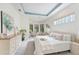 Spacious main bedroom with tray ceiling, sitting area, and bright windows at 4579 Tuscana Dr, Sarasota, FL 34241