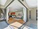 An indoor/outdoor patio area with sliding glass doors and view of the interior and exterior at 4579 Tuscana Dr, Sarasota, FL 34241