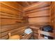 Relaxing sauna room with wooden benches and a heater at 4579 Tuscana Dr, Sarasota, FL 34241
