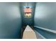Bright stairwell with natural lighting and light-colored walls leading to upper or lower level of the residence at 4579 Tuscana Dr, Sarasota, FL 34241