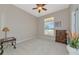 Empty bedroom featuring a ceiling fan and dresser at 4700 Mainsail Dr, Bradenton, FL 34208