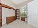 Bedroom featuring built-in shelving and drawers at 4700 Mainsail Dr, Bradenton, FL 34208