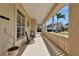 Inviting front porch with rocking chairs, offering a relaxing outdoor space at 4700 Mainsail Dr, Bradenton, FL 34208