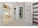 Hallway leading to main bedroom and bath at 4700 Mainsail Dr, Bradenton, FL 34208