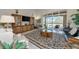 Comfortable living room with tile floors and stylish furnishings at 4700 Mainsail Dr, Bradenton, FL 34208