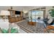 Comfortable living room with tile floors and stylish furnishings at 4700 Mainsail Dr, Bradenton, FL 34208