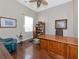 Spacious office with hardwood flooring, desk, and shelving at 4700 Mainsail Dr, Bradenton, FL 34208