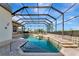 Beautiful pool area with a spa and covered structure, showcasing outdoor living at 4700 Mainsail Dr, Bradenton, FL 34208