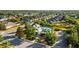 Community pool area surrounded by lush landscaping and well-maintained grounds at 4734 Claremont Park Dr, Bradenton, FL 34211