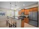 Modern kitchen features granite countertops, stainless steel appliances, and ample cabinet space at 4734 Claremont Park Dr, Bradenton, FL 34211