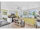 Bright kitchen featuring lots of natural light, an island, and modern appliances at 5012 Eastchester Dr, Sarasota, FL 34234