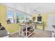 Eat-in kitchen with natural light and an island perfect for food preparation at 5012 Eastchester Dr, Sarasota, FL 34234