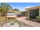 Expansive backyard with a patio, offering an ideal setting for outdoor activities and Gathering gatherings at 5353 Starwood Pl, Sarasota, FL 34232