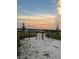 Outdoor fitness park featuring pull up bars with a view of the lake at 5521 Summit Gln, Bradenton, FL 34203