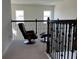 Relaxing loft area with comfortable armchair and ottoman perfect for reading and lounging at 5521 Summit Gln, Bradenton, FL 34203