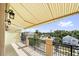 Relaxing balcony area offering shade and a view of the surrounding area at 555 N Orange Ave # 307, Sarasota, FL 34236