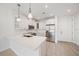 Modern kitchen features stainless appliances, quartz countertops, and plenty of cabinet space at 555 N Orange Ave # 307, Sarasota, FL 34236