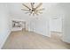 Bright, open floor plan showcasing wood-look tile, and an adjacent kitchen at 555 N Orange Ave # 307, Sarasota, FL 34236
