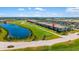 Beautiful aerial view overlooking the community pond and golf course at 5685 Palmer Cir # 204, Lakewood Ranch, FL 34211
