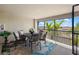 Outdoor balcony featuring a ceiling fan, patio furniture, and beautiful views of a golf course at 5685 Palmer Cir # 204, Lakewood Ranch, FL 34211
