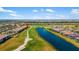 Stunning aerial view of the homes overlooking the golf course and pond at 5685 Palmer Cir # 204, Lakewood Ranch, FL 34211