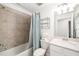 Clean bathroom with a tub-shower combination, vanity and neutral finishes at 5685 Palmer Cir # 204, Lakewood Ranch, FL 34211