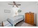 Cozy bedroom with a ceiling fan and a bright, inviting atmosphere at 5685 Palmer Cir # 204, Lakewood Ranch, FL 34211